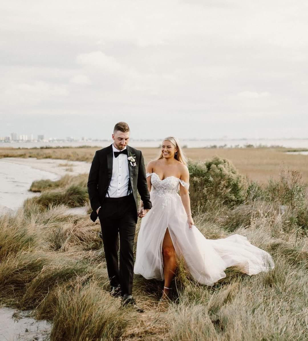 Photo of the real bride and groom walking